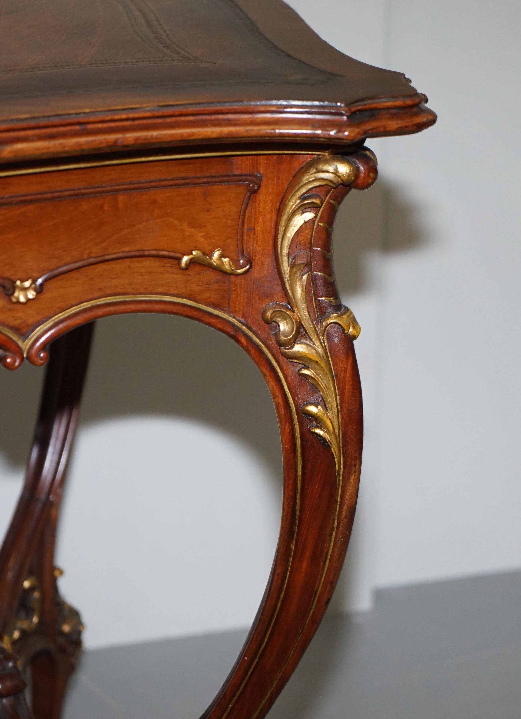 Pine desk with leather and gilding, late Victorian period around 1900.