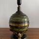 Art Deco table lamp in patinated bronze with eagles holding a globe, France 1940.