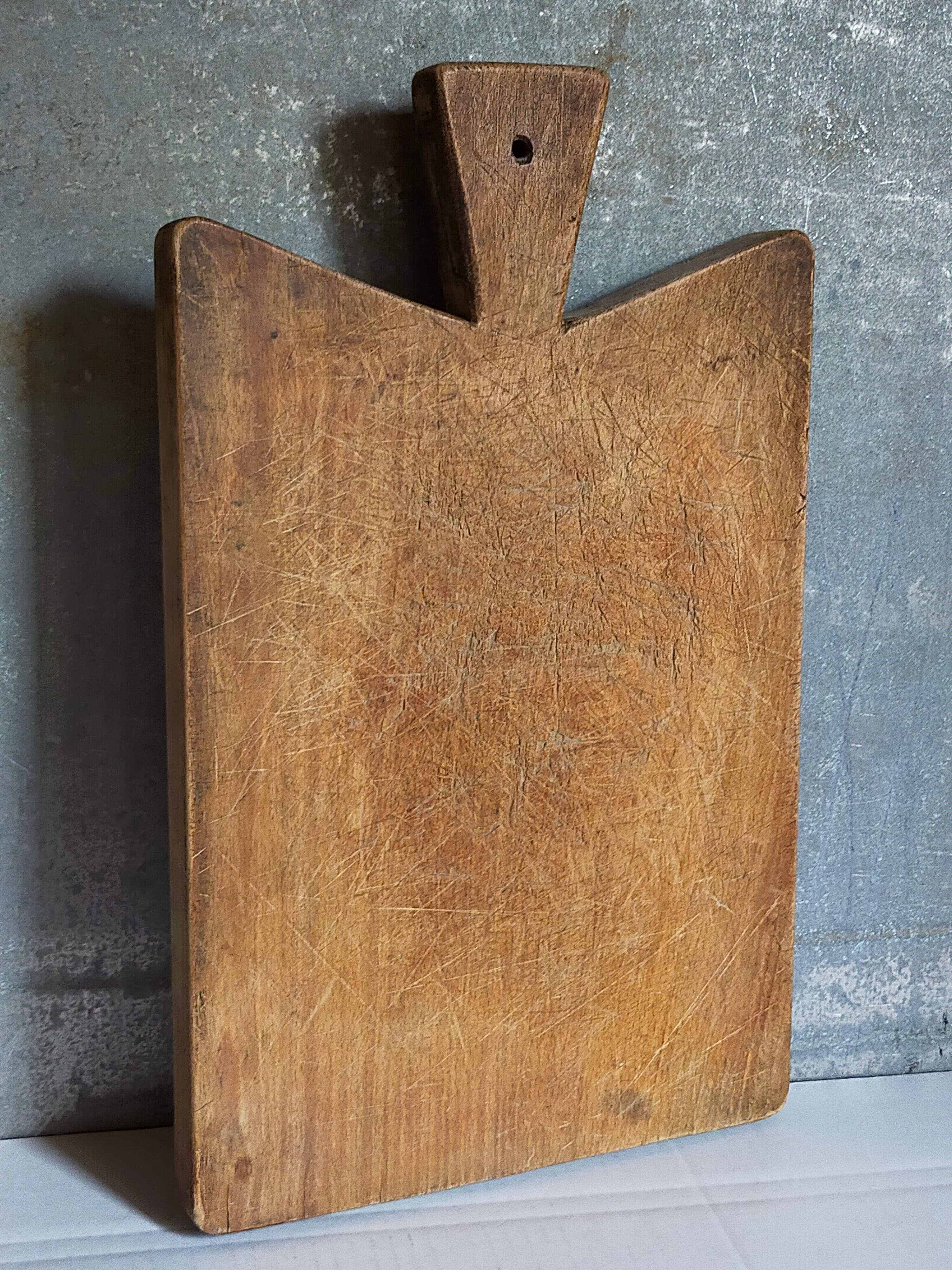 Cutting board in old solid wood