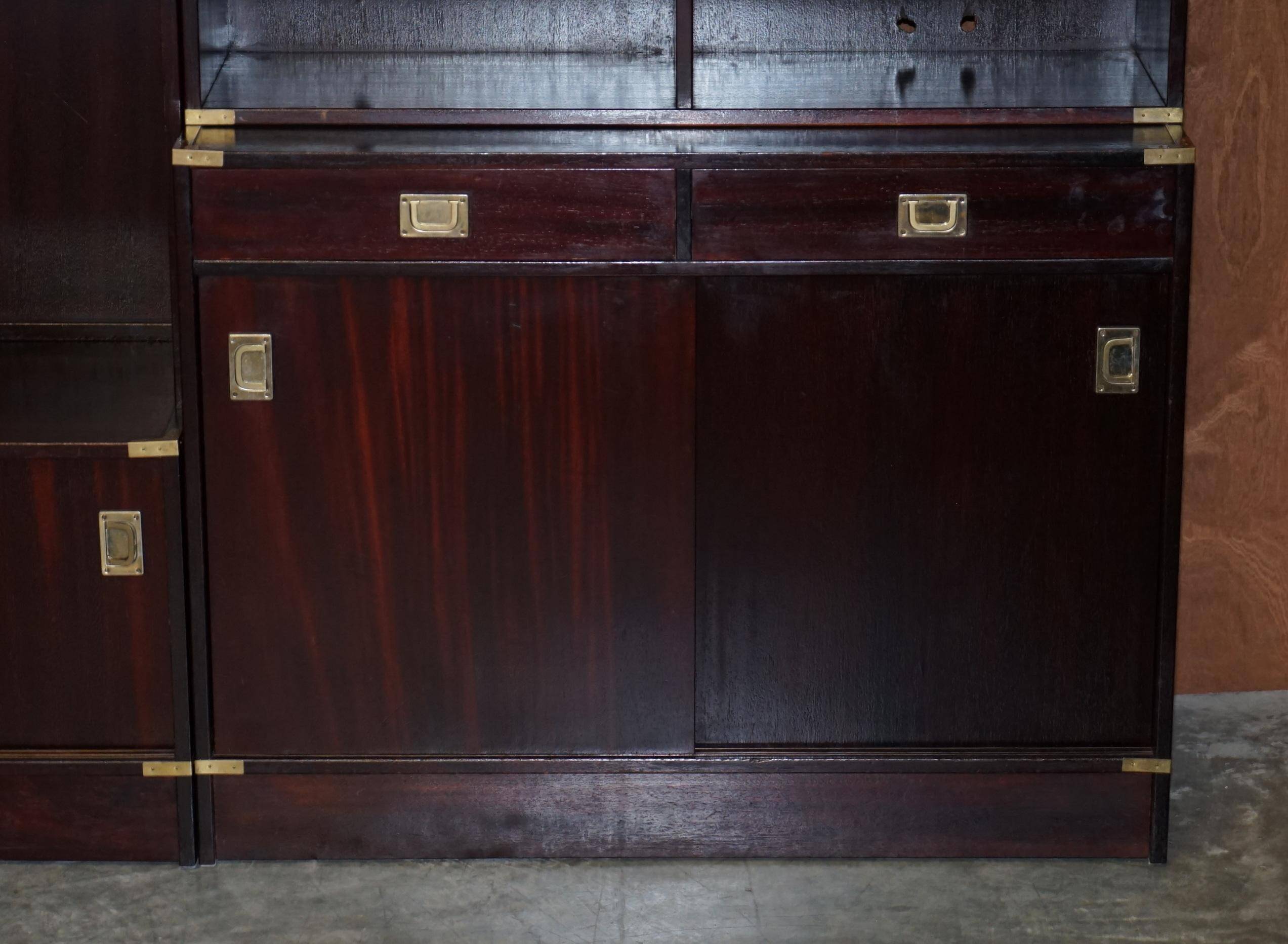 Three vintage style Military Campaign bookshelves, mahogany finish.