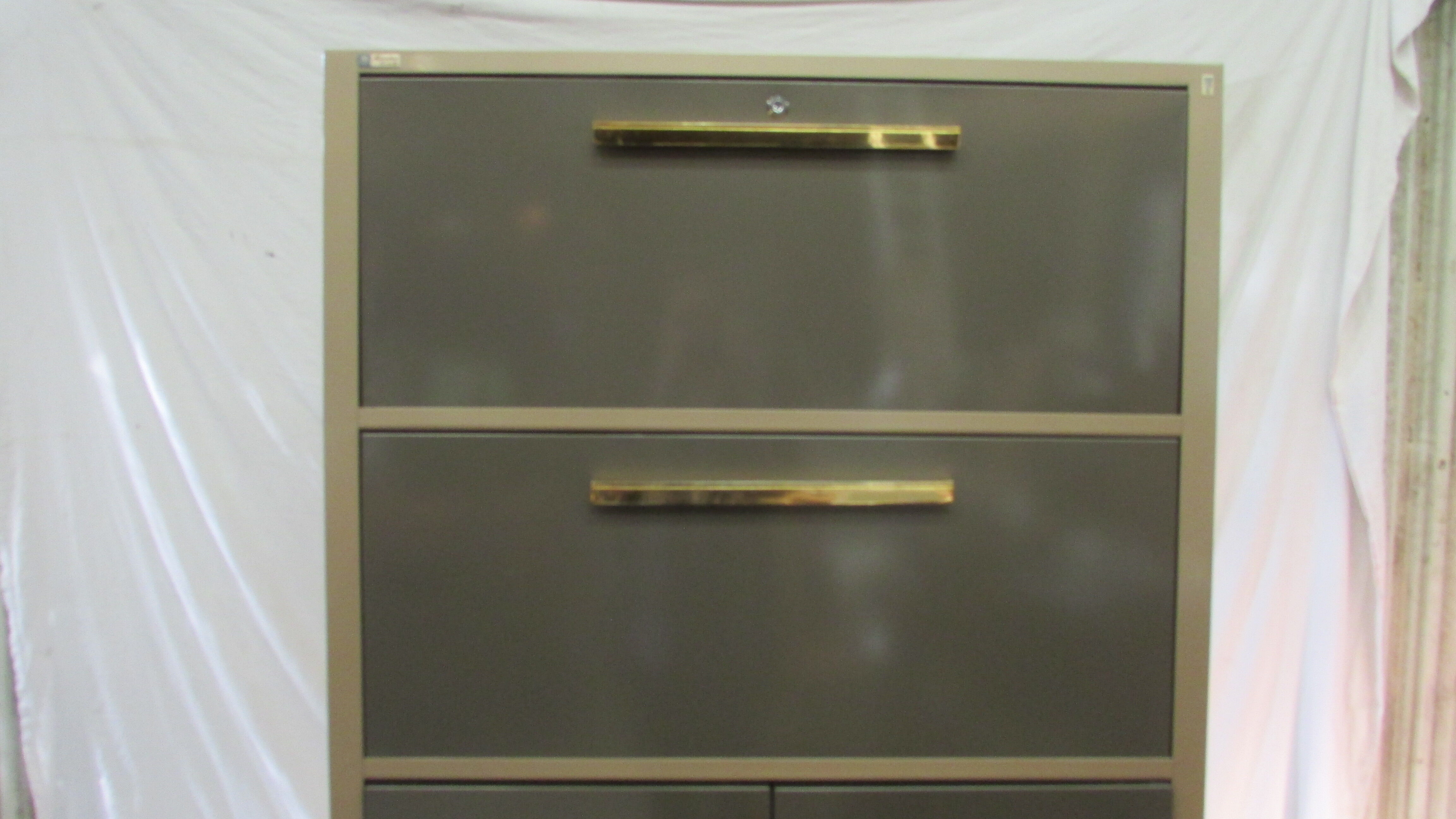 Atcho brand storage cabinet with flap