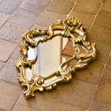 Antique Baroque mirror with gilded metal panels