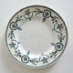 4 mismatched iron earth dessert plates