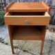Wooden bedside table, warm tones, vintage, 1950s.