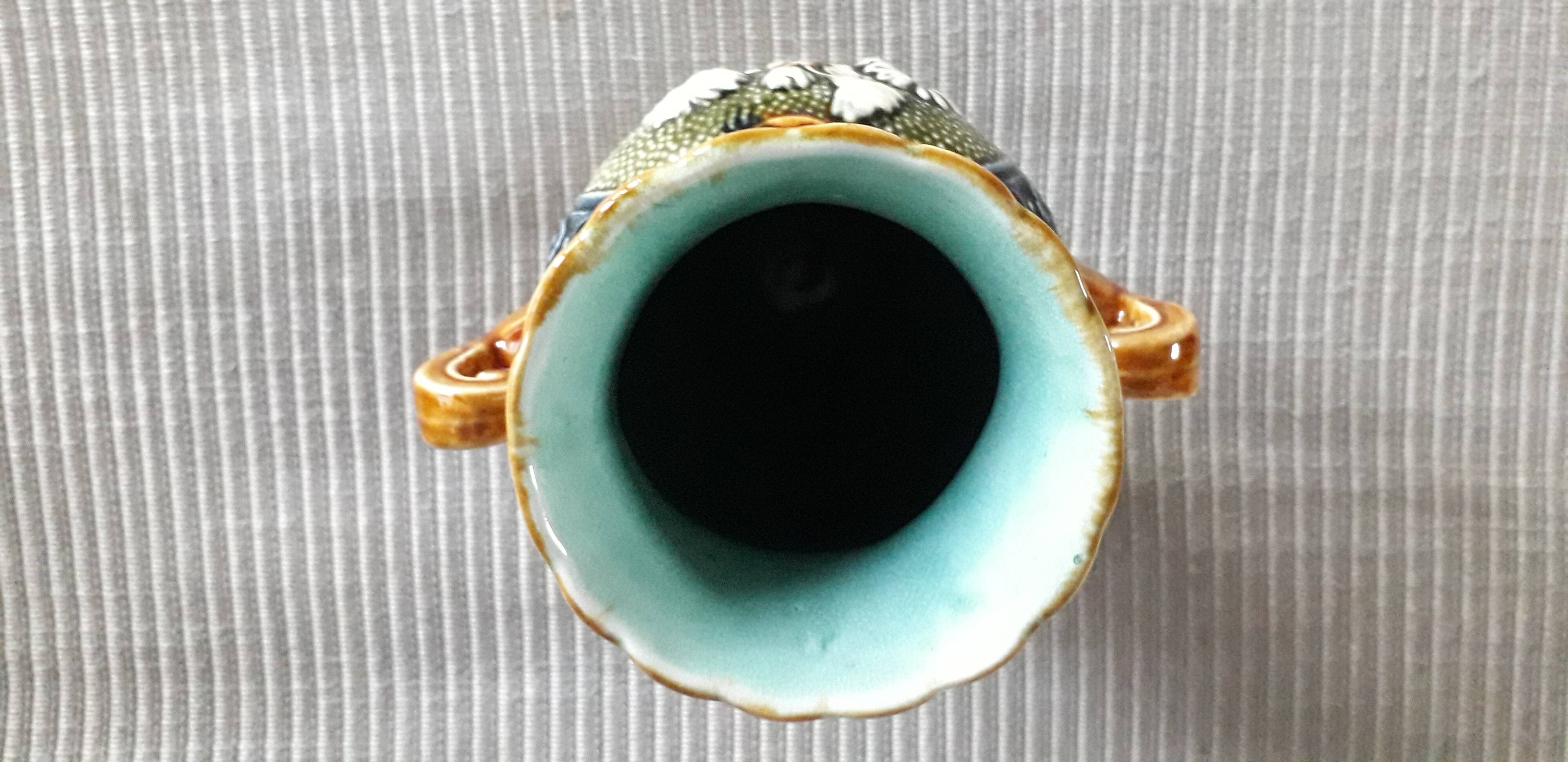 Vintage slip vase with floral decoration