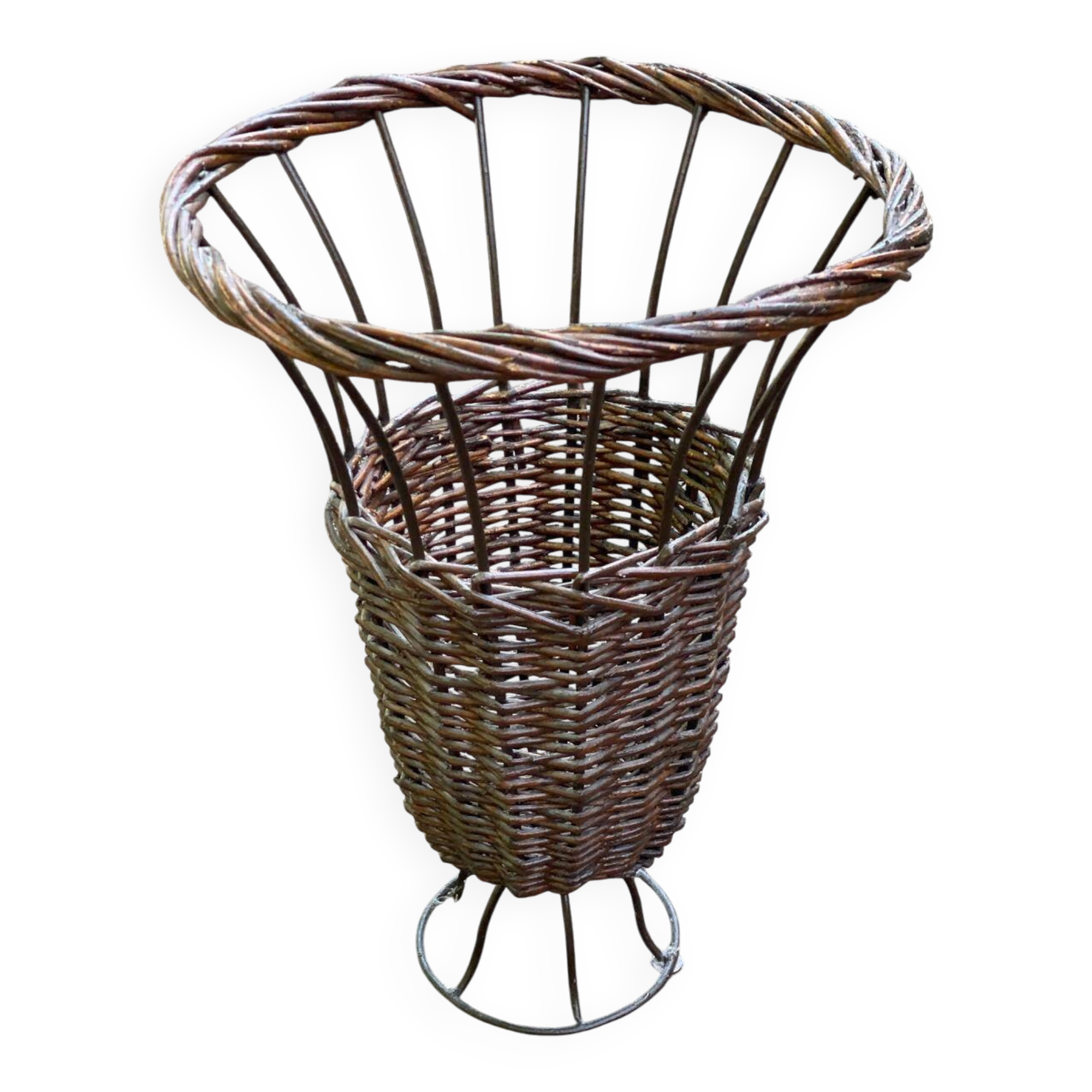 Vintage umbrella stand in rattan, woven wicker, and steel.