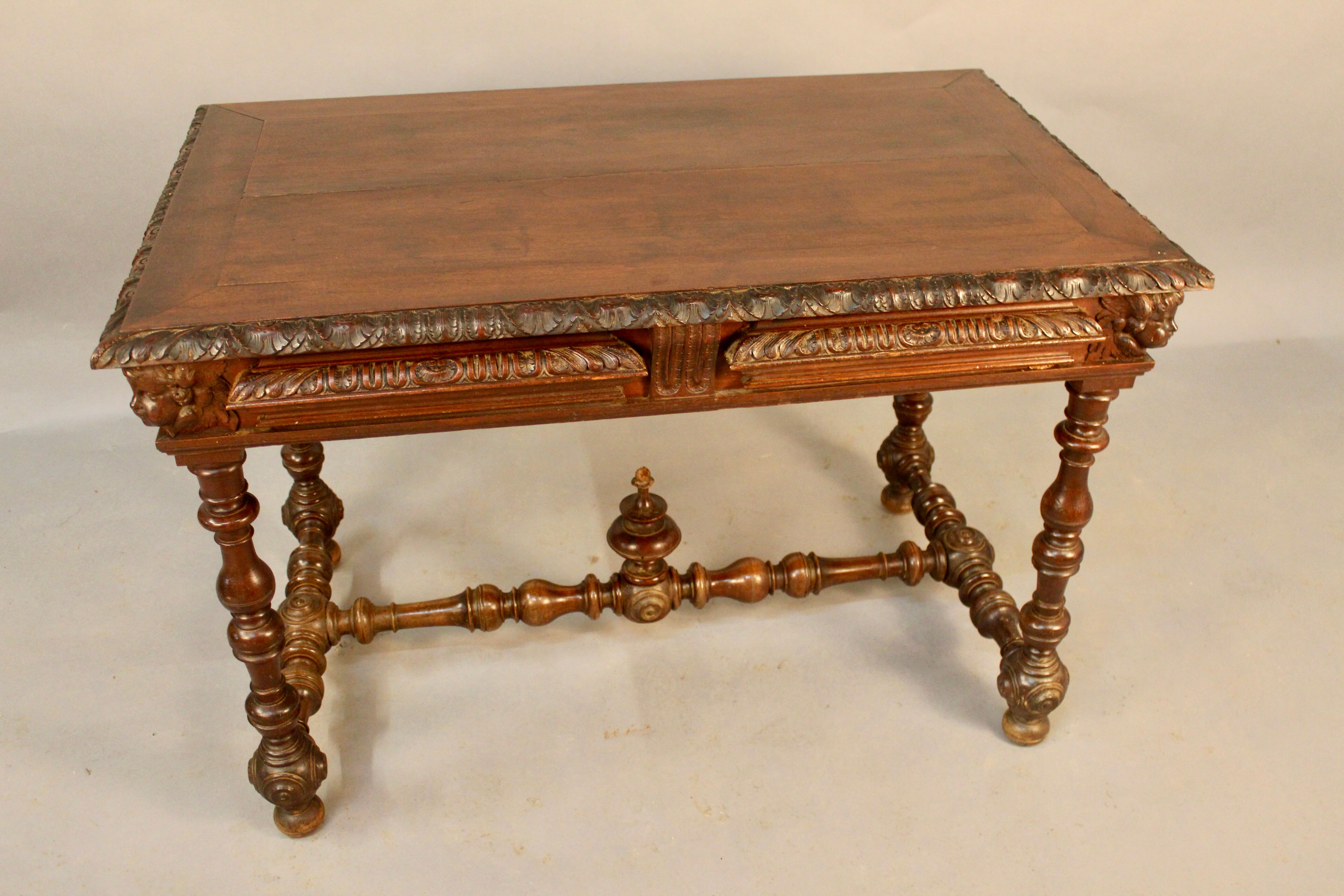 Louis XIII style writing table with Putti decoration