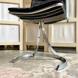 2 chairs in chromed metal and black woven skaï 1970s