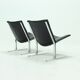 Set of 2 Danish lounge chairs by Kebe Møbler model Eagle with black leather.