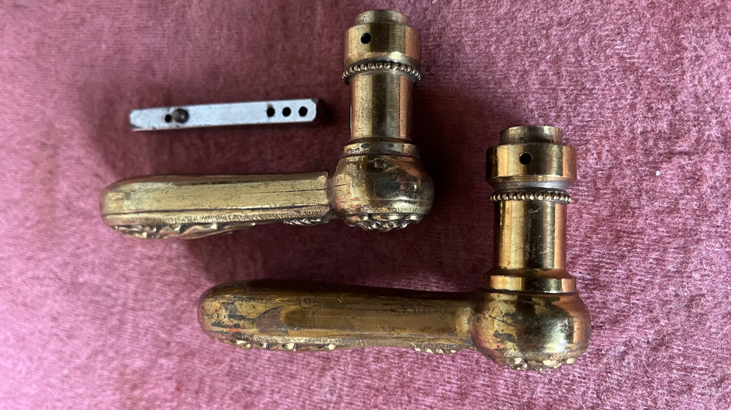 Pair of antique bronze handles
