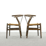 Pair of CH24 wishbone dining chairs by Hans Wegner for Carl Hansen Denmark