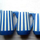 Blue and white ceramic milk pitcher by Sarreguemines model Fox Trott