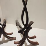 Paire de chenets en fer  forgé par Raymond Subes vintage