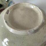 Two large vintage bowls in pastel decor on mini pedestals.