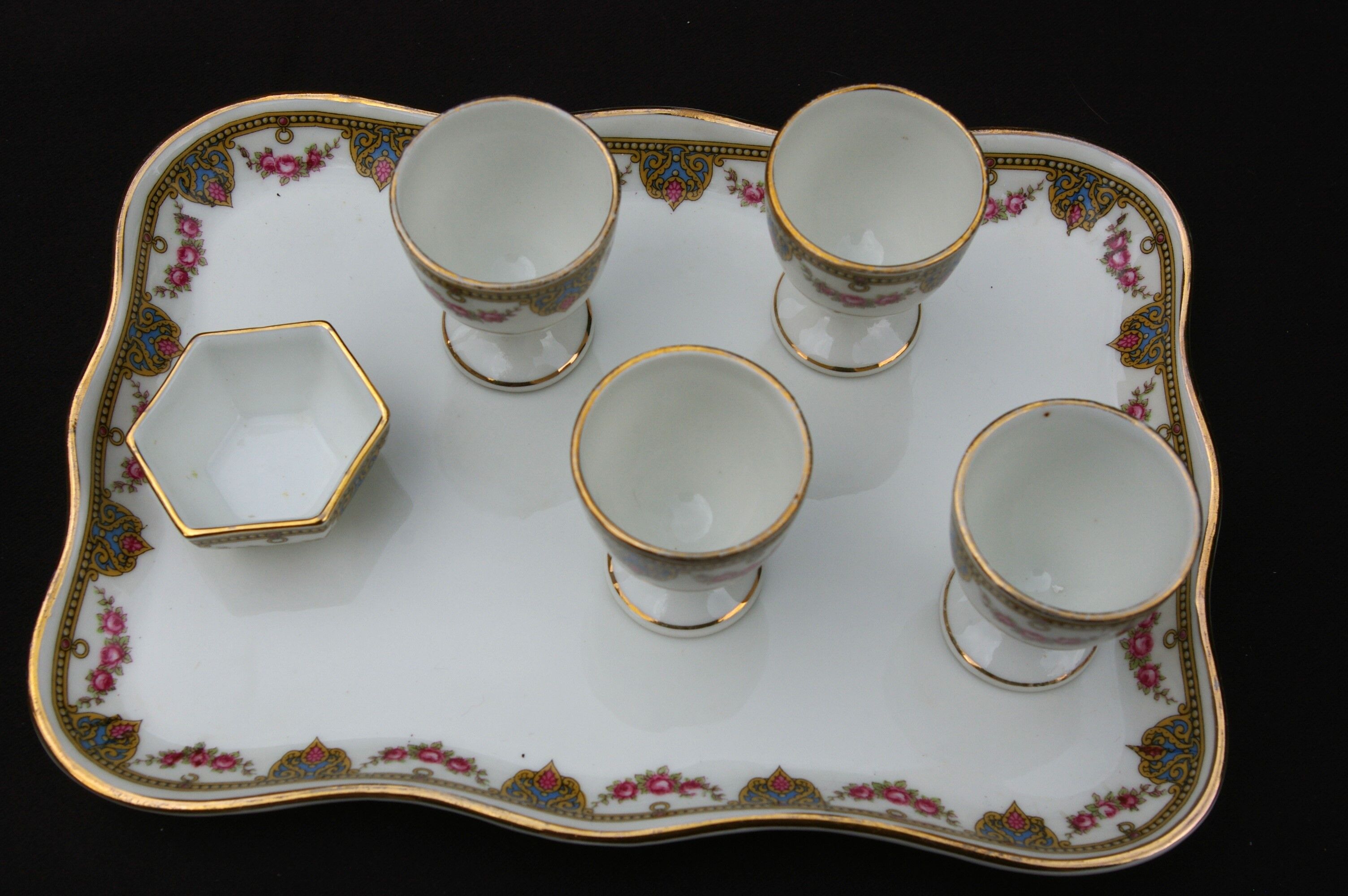 Egg service in Limoges porcelain