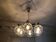 Hans-Agne Jakobsson "Pastoral" brass chandelier with six globes.