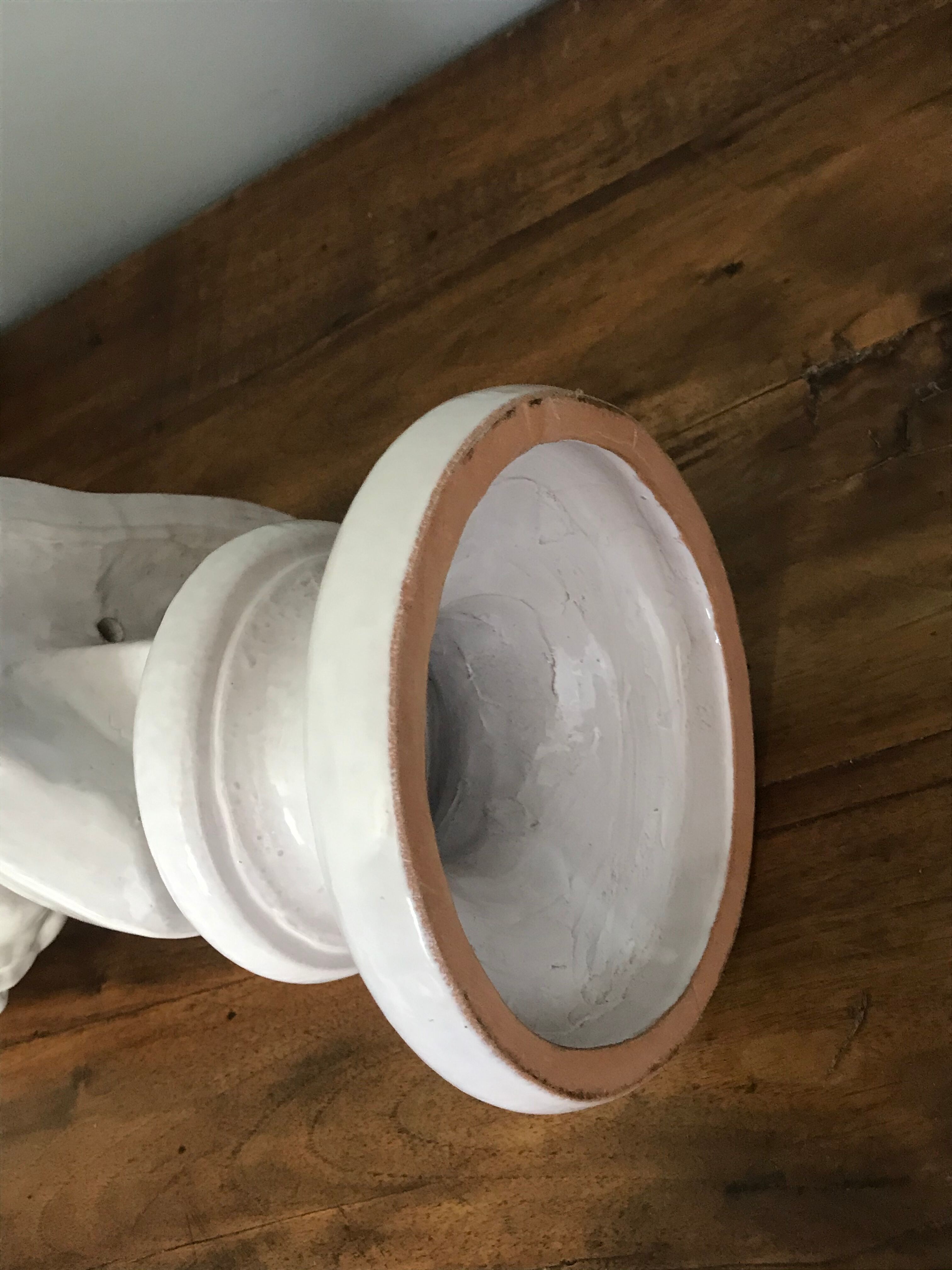 Child bust in enamelled terracotta