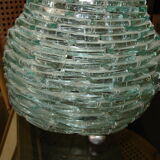 Lamp in glass pieces assembled on metal frame