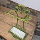 Art Nouveau umbrella stand in green enamelled cast iron