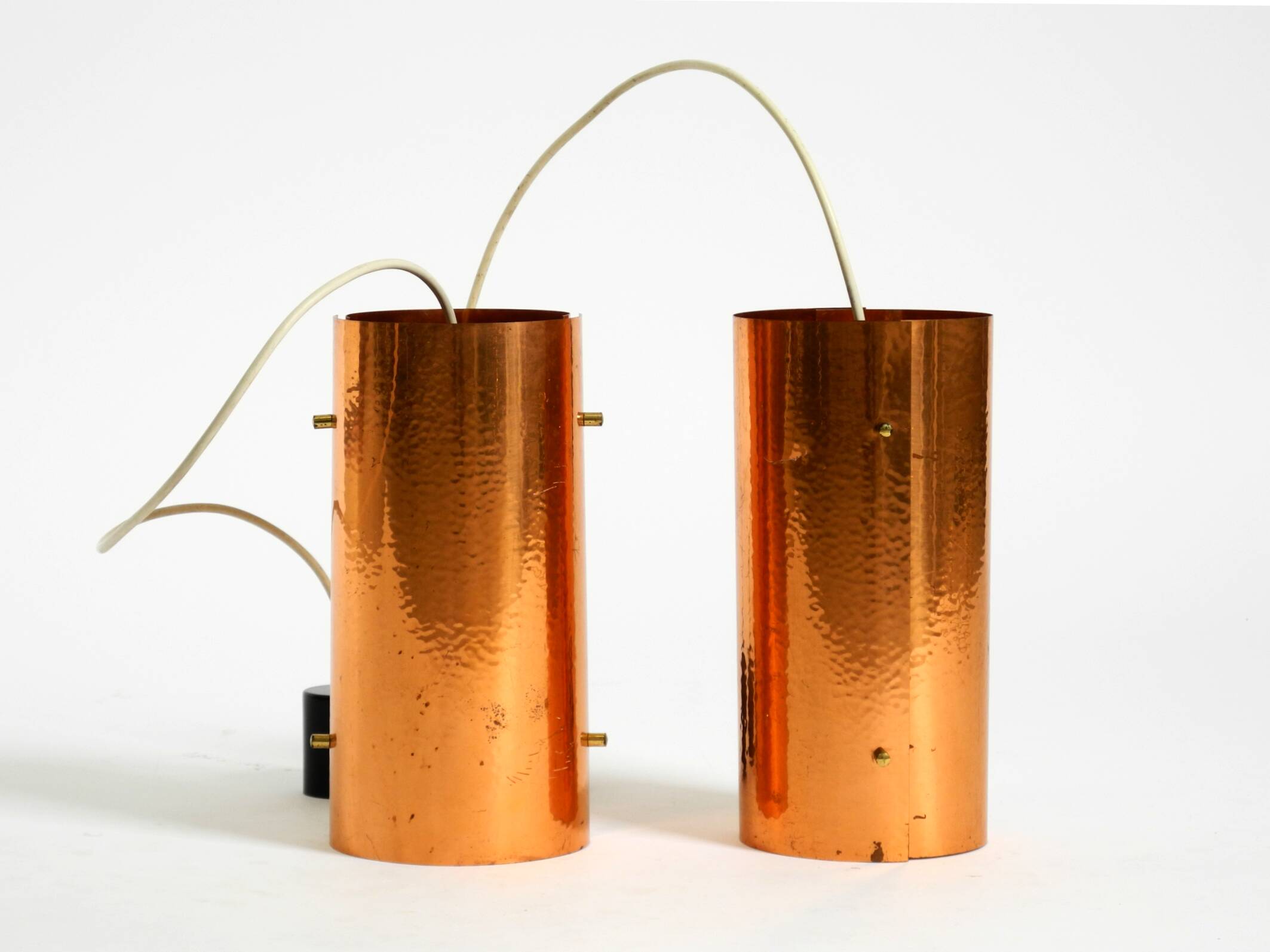Two 50s tube pendant lamps consisting of two screwed-together copper bowls