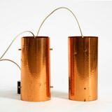 Two 50s tube pendant lamps consisting of two screwed-together copper bowls