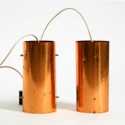 Two 50s tube pendant lamps consisting of two screwed-together copper bowls