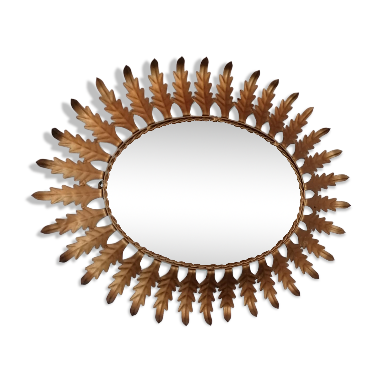 Oval sunburst mirror with leaves of acanthus 1960s