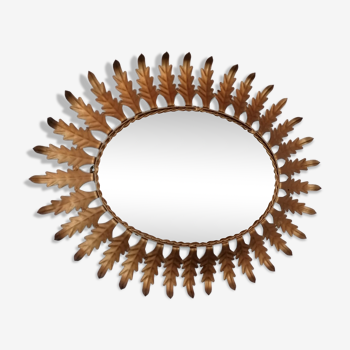 Oval sunburst mirror with leaves of acanthus 1960s