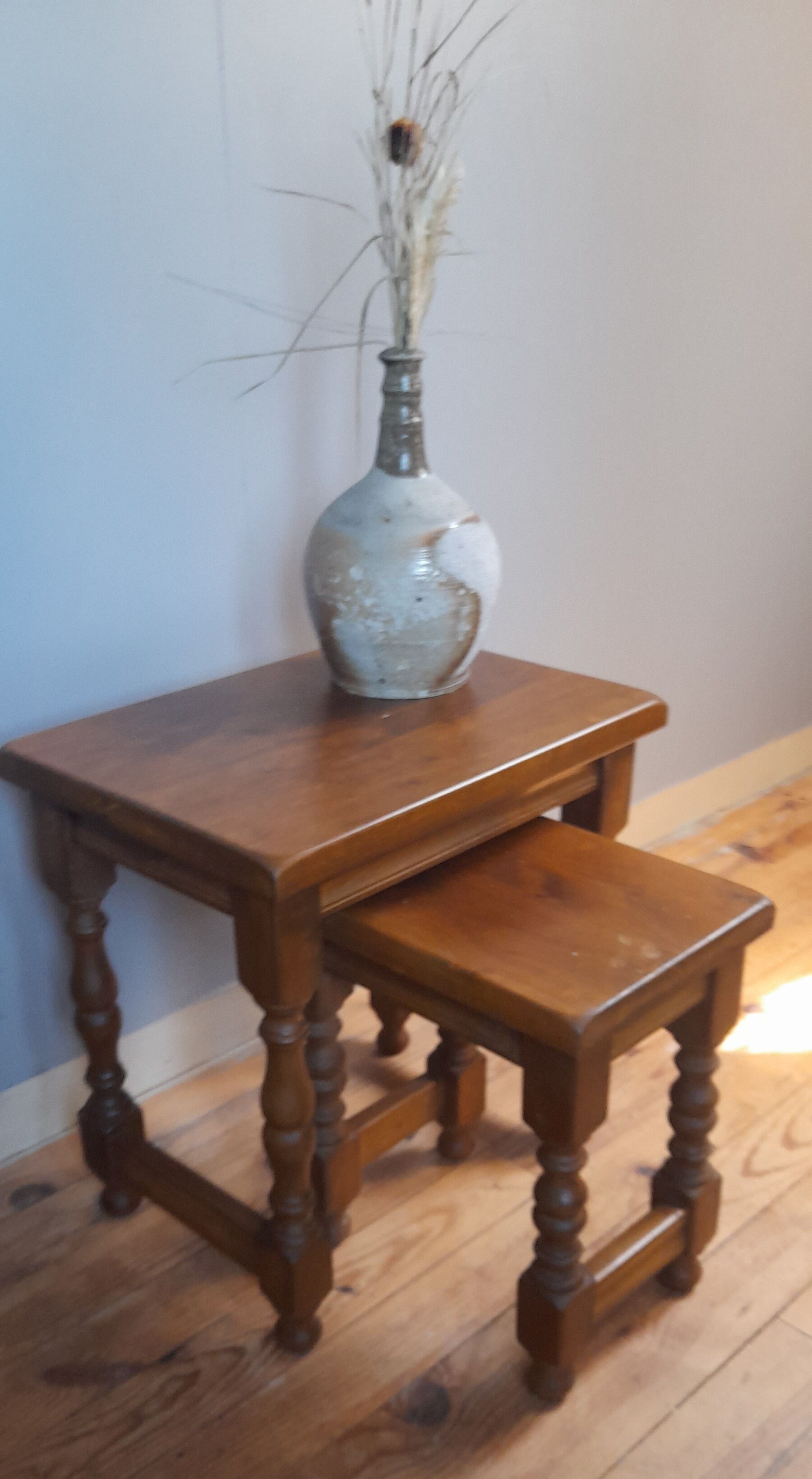 2 solid wood trundle tables, turned legs 80