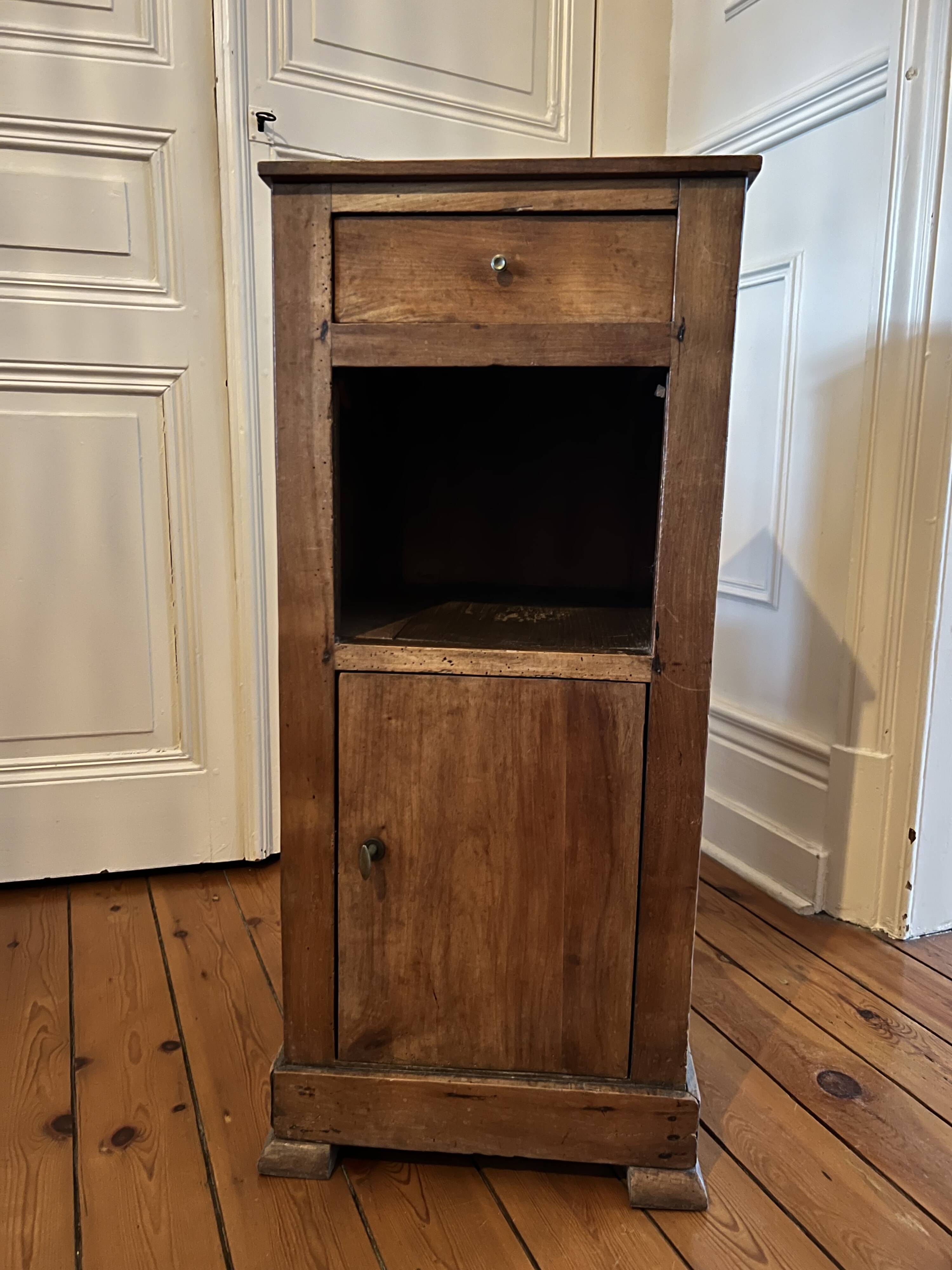 Old wooden bedside table