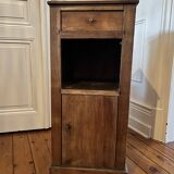 Old wooden bedside table