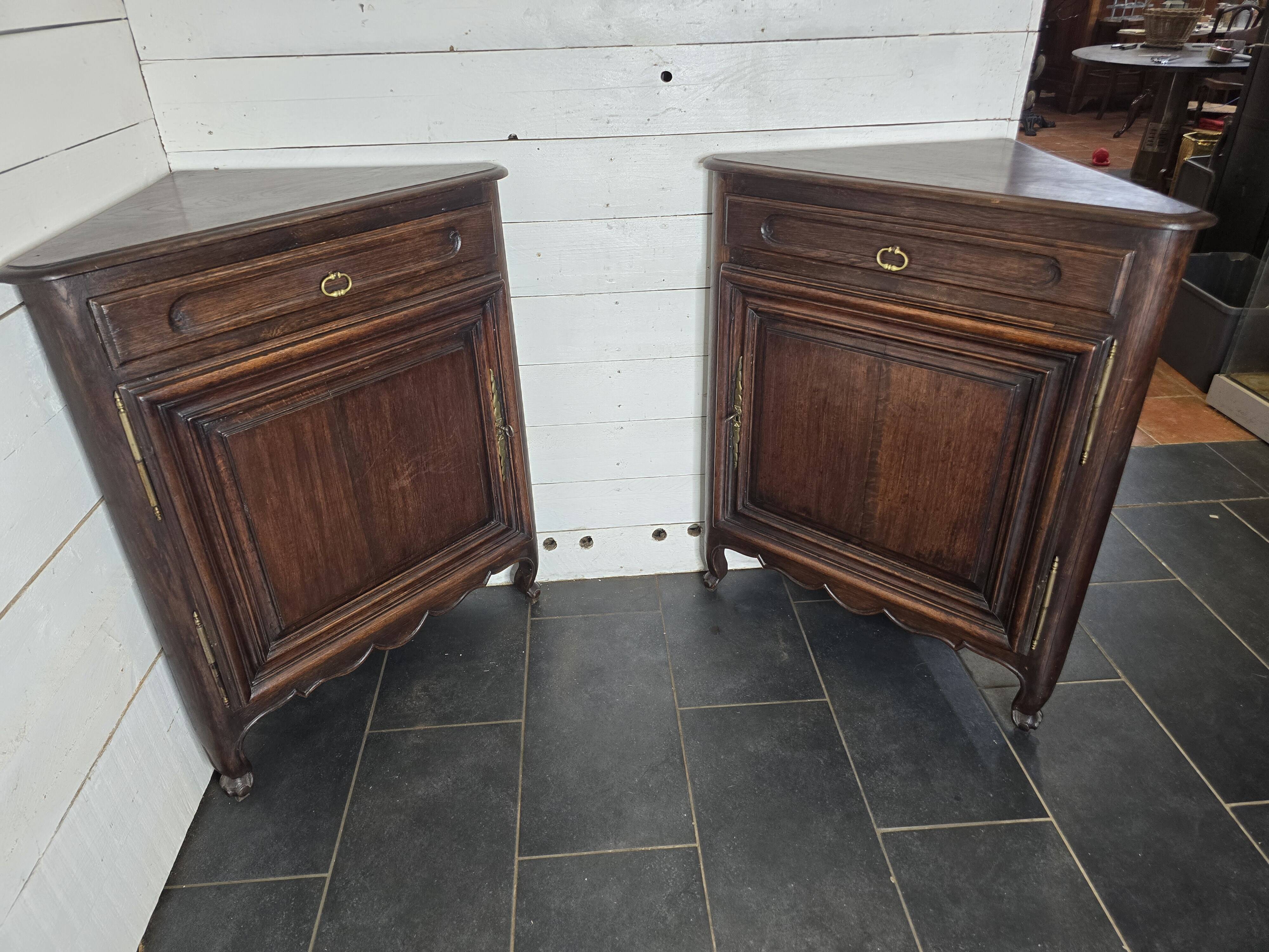 Pair of oak corner cabinets