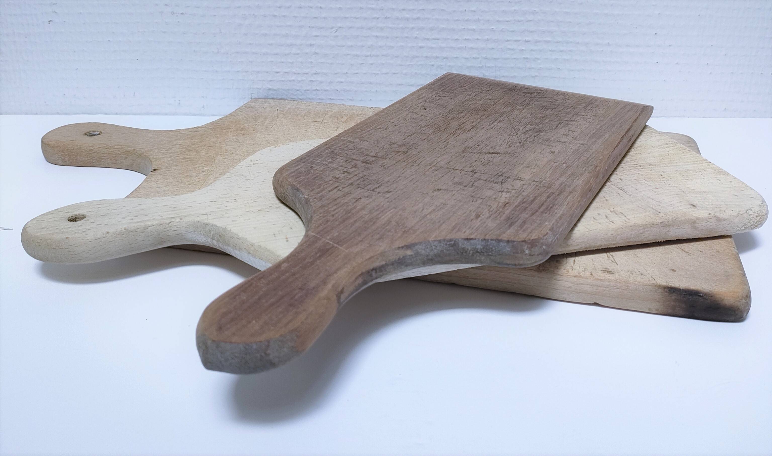 Three vintage solid wood cutting boards