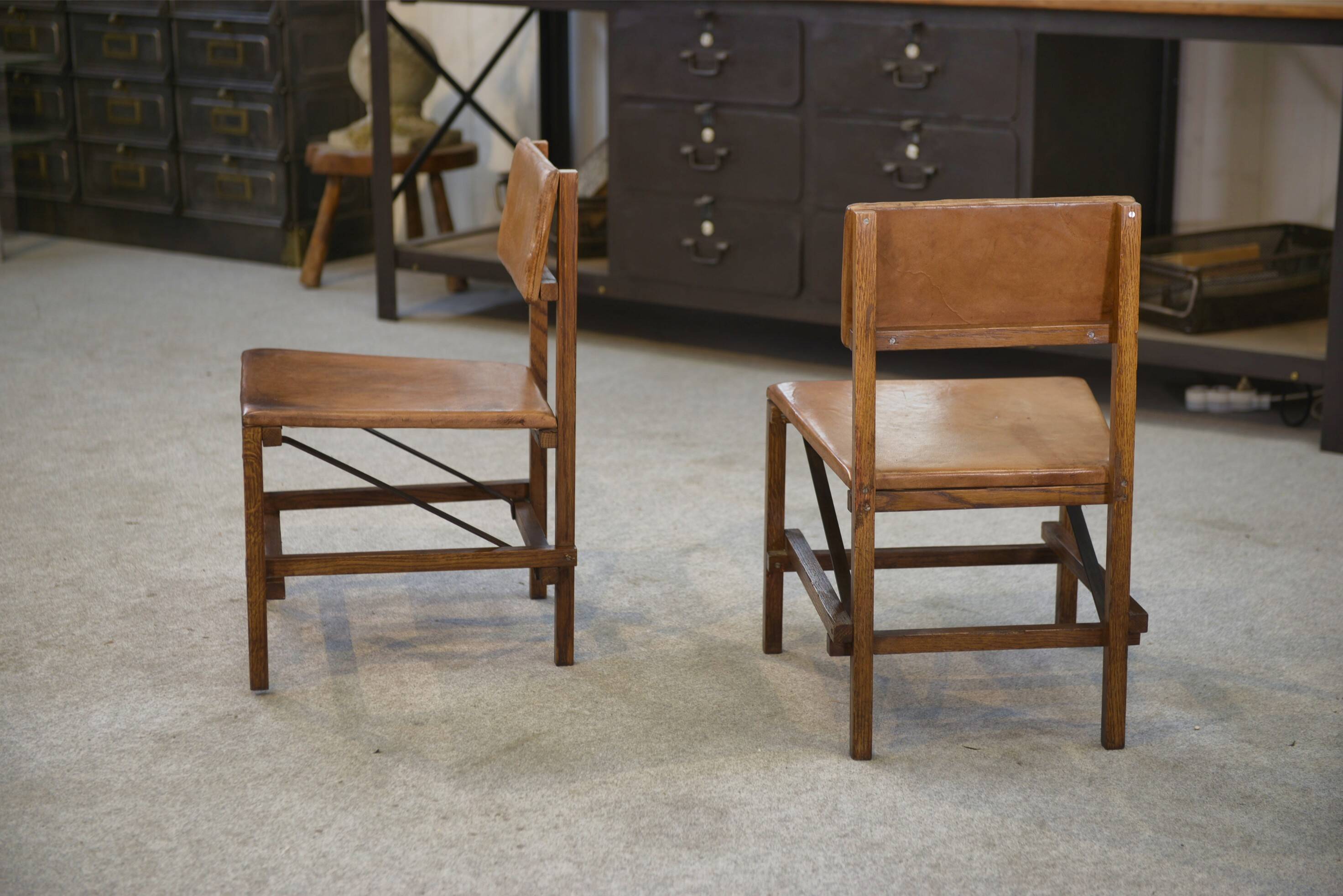 Pair of oak and leather chairs in the style of Gerrit Rietveld 1960s.
