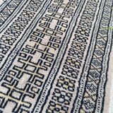 Vintage hand knotted rug with geometric patterns on a grey/beige/terracotta background 170 x 96 cm