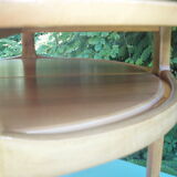 Round coffee table in solid walnut double tray of the 1970s