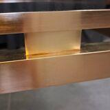Table basse Guy Lefevre en laiton et verre