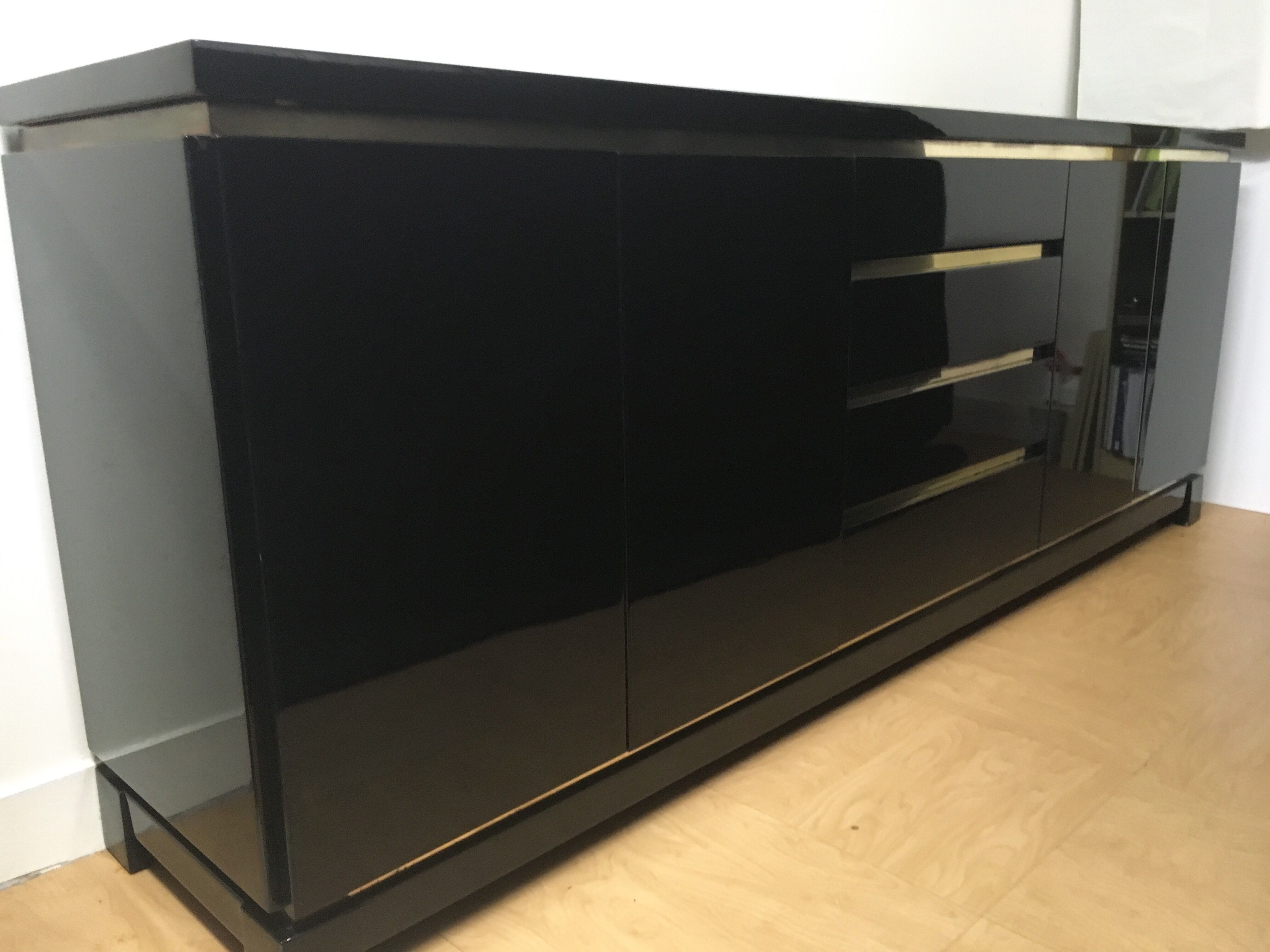 Wide row black lacquer and brass