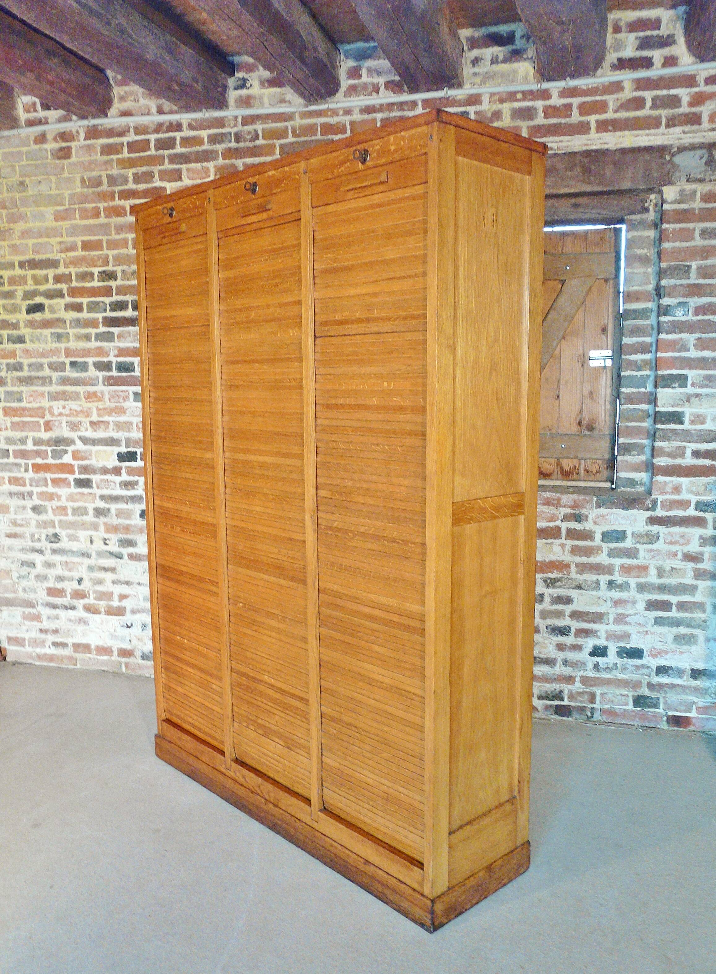 Furniture filing three curtains in oak 50s