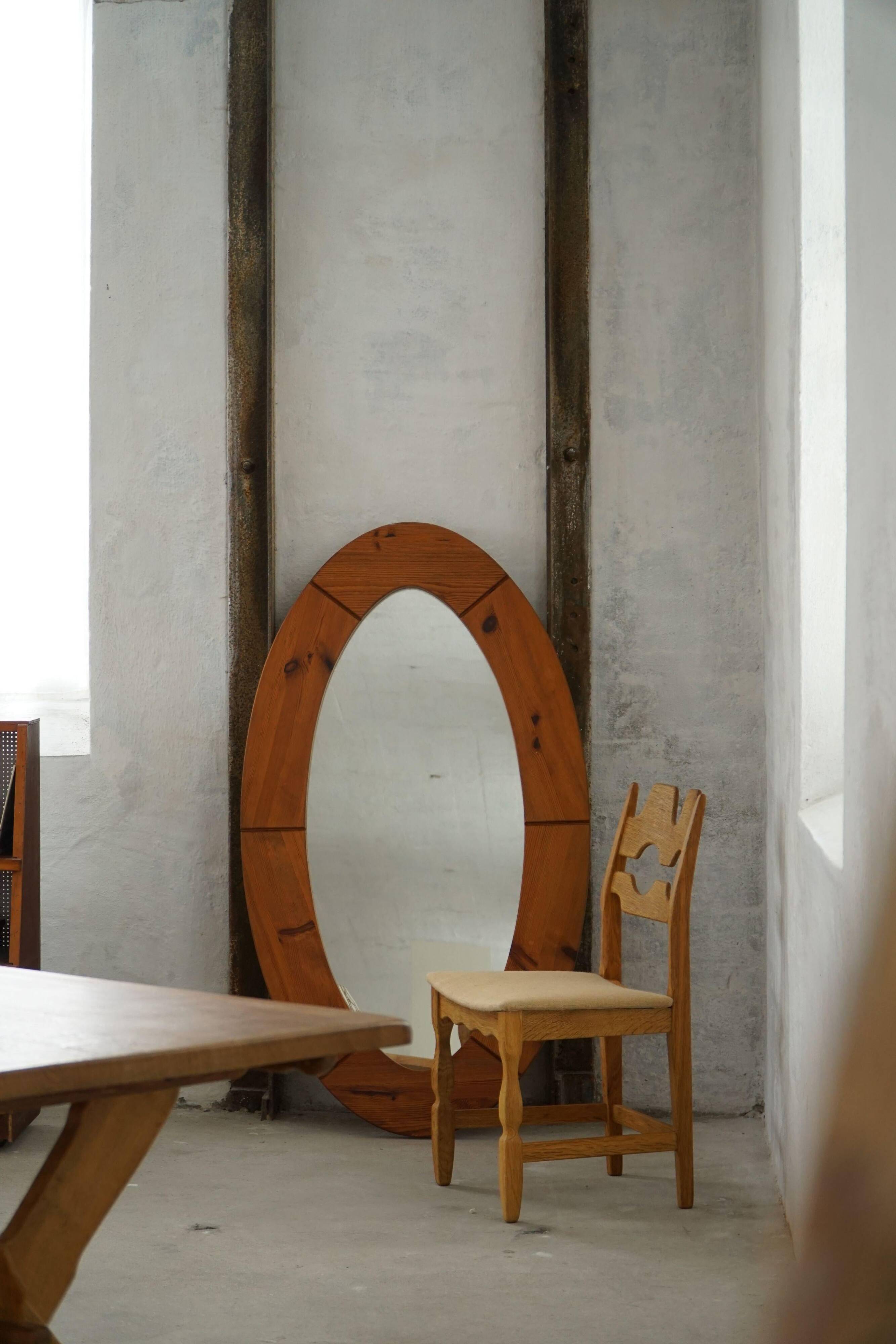 Large oval wall mirror in solid pine by Glasmäster Markaryd, Sweden, 1960s.