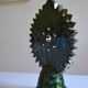 Green ceramic sun candlestick from Tamegroute, Morocco.