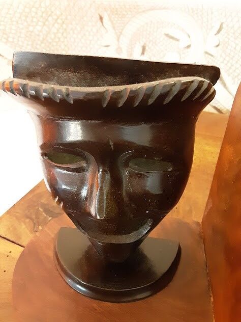 Greenhouses books bronze and wood african art