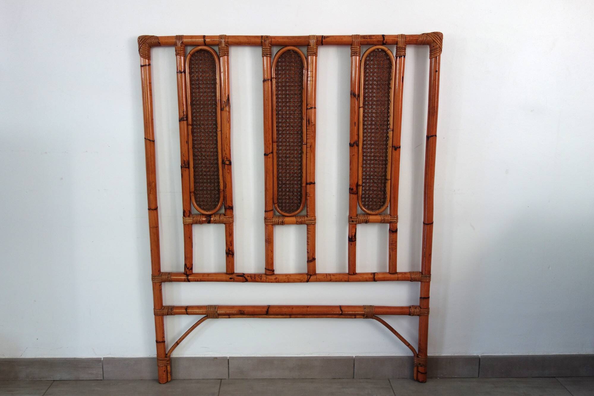 Bamboo and cane headboard from the 1970s.