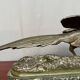 Rene Andre Varnier. Bronze figure of a pheasant on a green marble base.