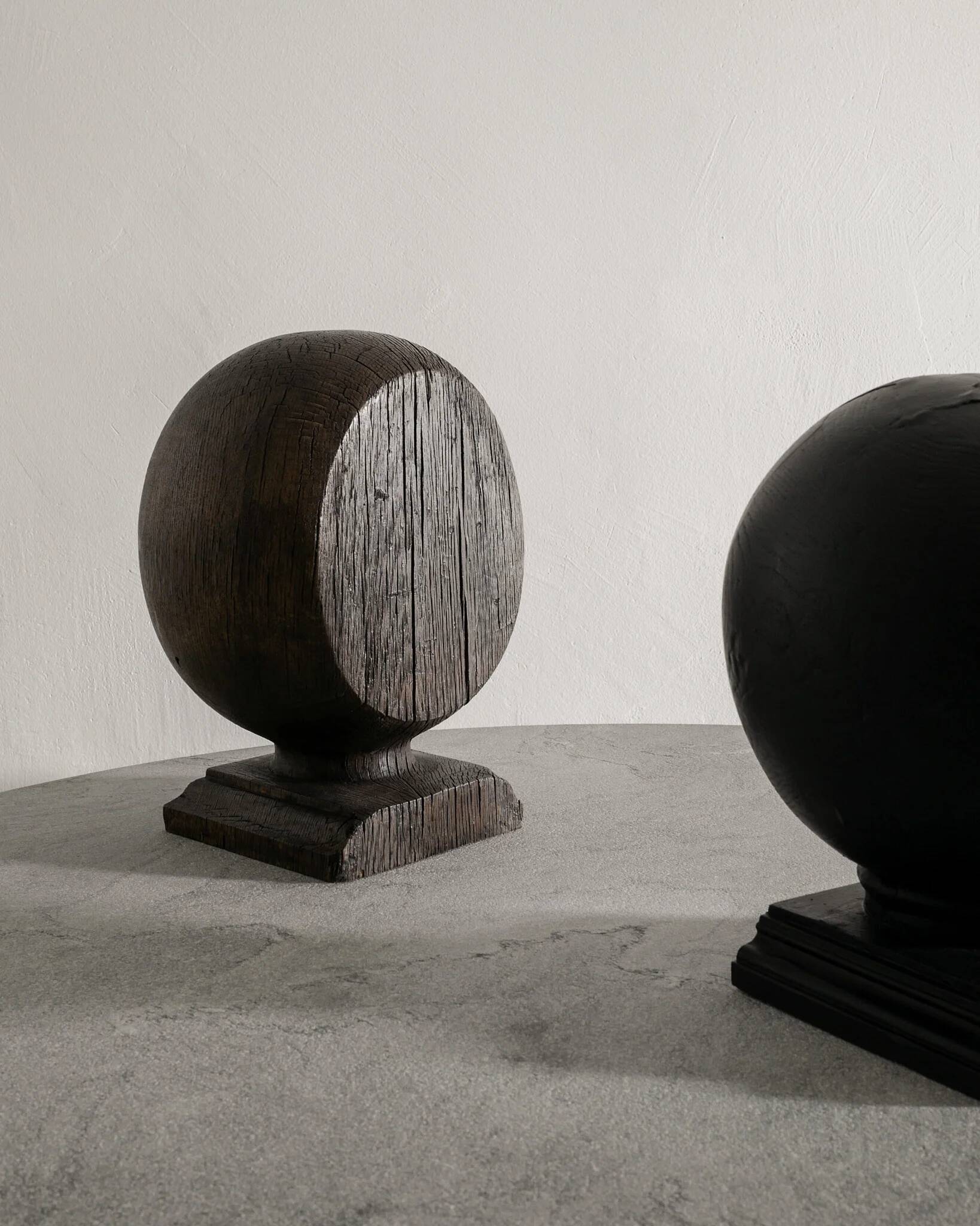 Pair of Vintage Black & Brown Round Wooden Sculptures
