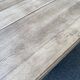 Rectangular Art Deco dining table with a central pedestal, stripped in solid oak.