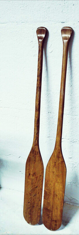 Pair of old wooden oars
