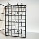 Vintage black metal wall loom display