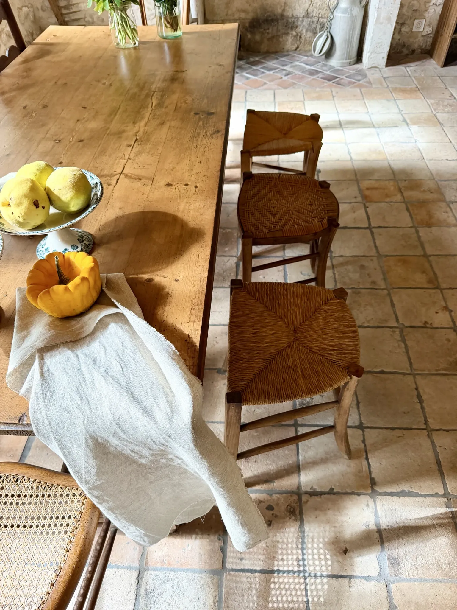 Campaign stool in rattan and wood