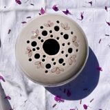 Vase with flowers in glazed ceramic